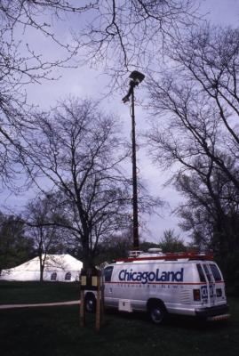 Chicagoland Television News truck parked near tent during Arbor Week