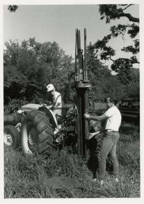 Gary Watson (on tractor) and Mike Spravka in Round Meadow gathering soil samples to study roots of white oaks in amended soils, Giddings Rig