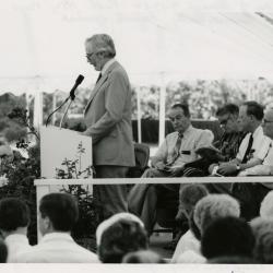 Research Building dedication - Russell Beatty, keynote speaker, at podium in tent - (Seated L to R): George Ware, Suzette Morton Davidson, Charles Haffner III, Marion Hall