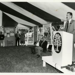 Tony Tyznik Retirement Party in tent - Gerry Donnelly addressing guests at podium - (Seated L to R): Tony Tyznik, Gerry Donnelly