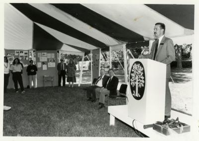 Tony Tyznik Retirement Party in tent - Gerry Donnelly addressing guests at podium - (Seated L to R): Tony Tyznik, Gerry Donnelly