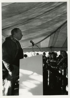 Earth Day - Charles Haffner at podium in tent