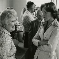 Evelyn Rasch Naser Retirement Party in tea room - Evelyn Naser (left) and Nancy Hart in conversation