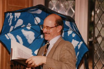 George Ware Retirement Party in Founders Room - Michael Stieber with Magritte umbrella
