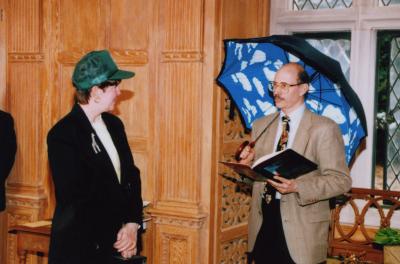 George Ware Retirement Party in Founders Room - Nancy Stieber in green cap; Michael Stieber with Magritte umbrella