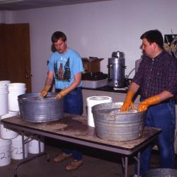 Salt Study, Pat Kelsey (right) and Rick Hootman (left) washing buckets in research lab