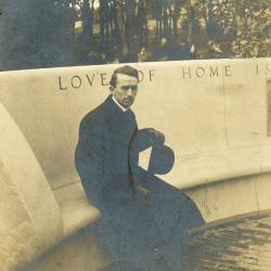Memorial dedication in honor of J. Sterling Morton at Arbor Lodge, man sitting on curved bench
