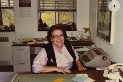 Myrtle Hansen at desk