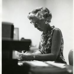 Elva Haver working at desk