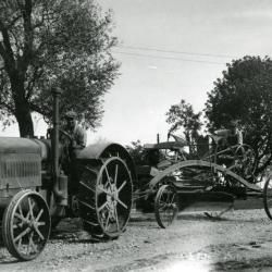 First Arboretum tractor pulling remodeled horse-drawn grader