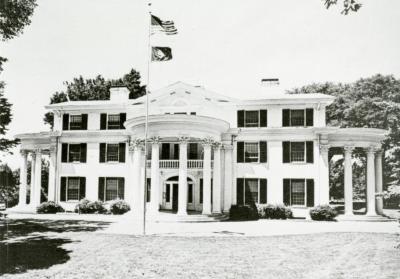 Arbor Lodge mansion, frontal view with flags
