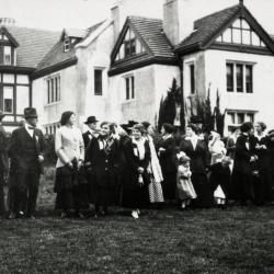 Large group of people standing in a row in front of Morton residence at Thornhill