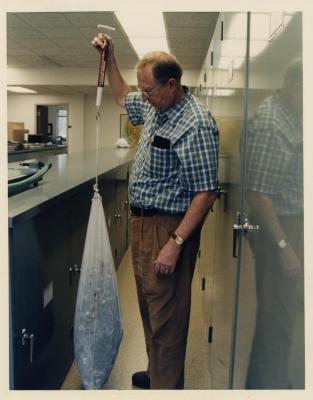Dr. William Hess weighing anti-cancer plants