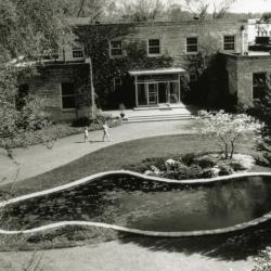 Administration Building front entrance and lily pond, aerial view
