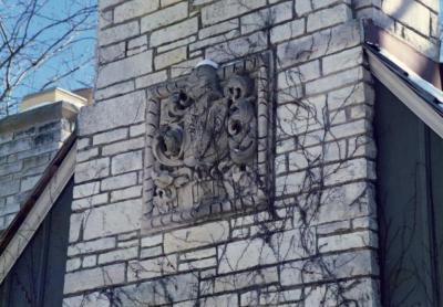 Chimney relief decoration on house (location unknown)