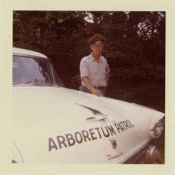 Fred Johnson, with Arboretum Patrol car