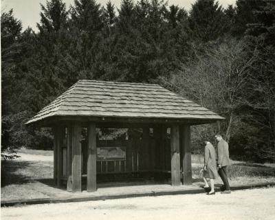 Two people approaching Arboretum Map Station