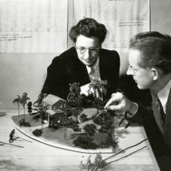 Clarence Godshalk and woman reviewing model in landscape modeling class