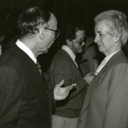 Clarence E. Godshalk's 90th birthday celebration scrapbook: Marion Hall talking with Helen Langrill