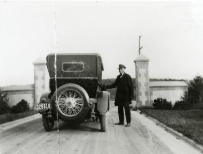 Frank D. Lindley, Joy Morton's chauffeur, at old Thornhill entrance gates