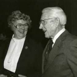 Clarence E. Godshalk's 90th birthday celebration scrapbook: Barbara Tyznik talking with Clarence Godshalk