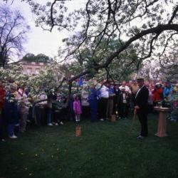 Twilight Tree Walk, Craig Johnson dressed as Joy Morton, speaking to crowd