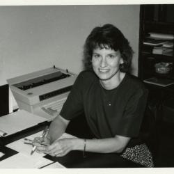 Linda Kovach at desk