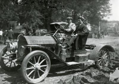 Sterling Morton driving automobile with man for premier at Algonquin