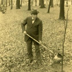 Joy Morton posed with shovel at Dawes Arboretum American Elm Tree Dedication to his father