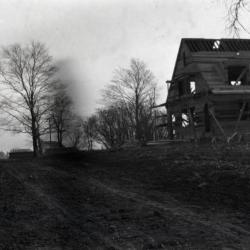 Arboretum entrance road (Joliet Road), showing Clarence Godshalk's first Arboretum house under construction along right side of road