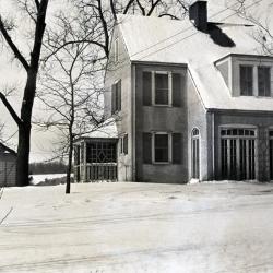 Clarence Godshalk's first Arboretum house and yard in winter, south side