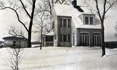 Clarence Godshalk's first Arboretum house and yard in winter, south side