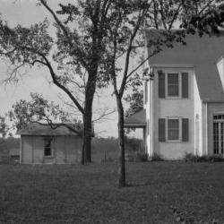 Clarence Godshalk's first Arboretum house and yard with detached garage, south side