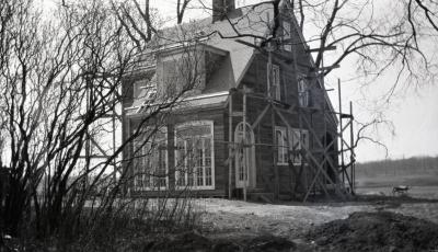 Clarence Godshalk's first Arboretum house, front and side view, under construction