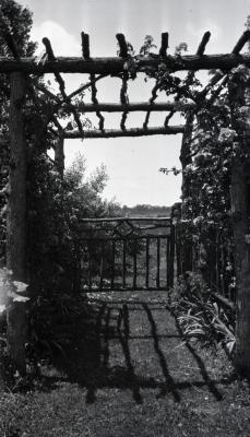 Clarence Godshalk's first Arboretum house, garden pergola and gate