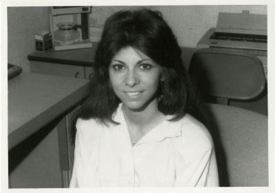 Pat Pellegrini at desk