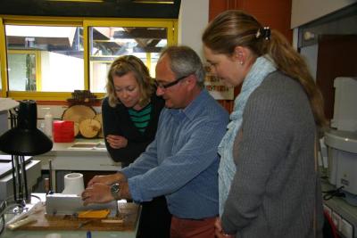 Nicole Cavender and Murphy Westwood observing lab equipment at the French National Institute for Agricultural Research