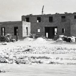 Administration Building construction in winter, first floor front view