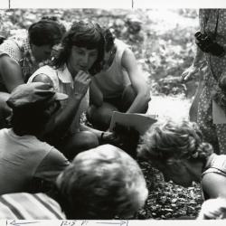 Pat Armstrong sitting with class in Schulenberg Prairie
