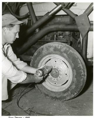 Tony Tyznik removing tire lug nuts