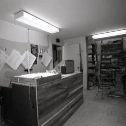 Sign Shop, work station with bulletin board