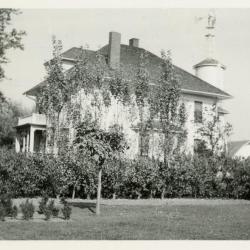 Original South Farm house with high water tank and windmill, built 1917, torn down 1930

