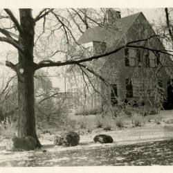 Clarence Godshalk's first Arboretum house, exterior side view of front from frozen Joliet Road, winter