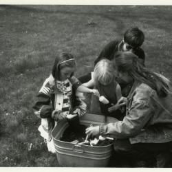 Arbor Day/Week, Rose Rieger planting seeds with children