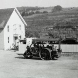 South Farm as it looked before 1935, equipment in courtyard between buildings