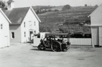 South Farm as it looked before 1935, equipment in courtyard between buildings