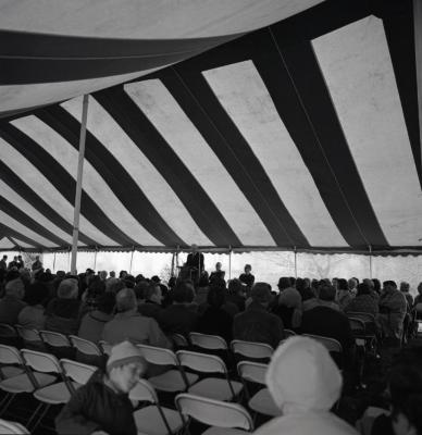 Arbor Day Centennial, afternoon program, Clarence Godshalk at podium speaking to seated guests in tent