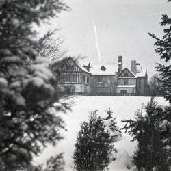 Partial south view of Morton residence in winter